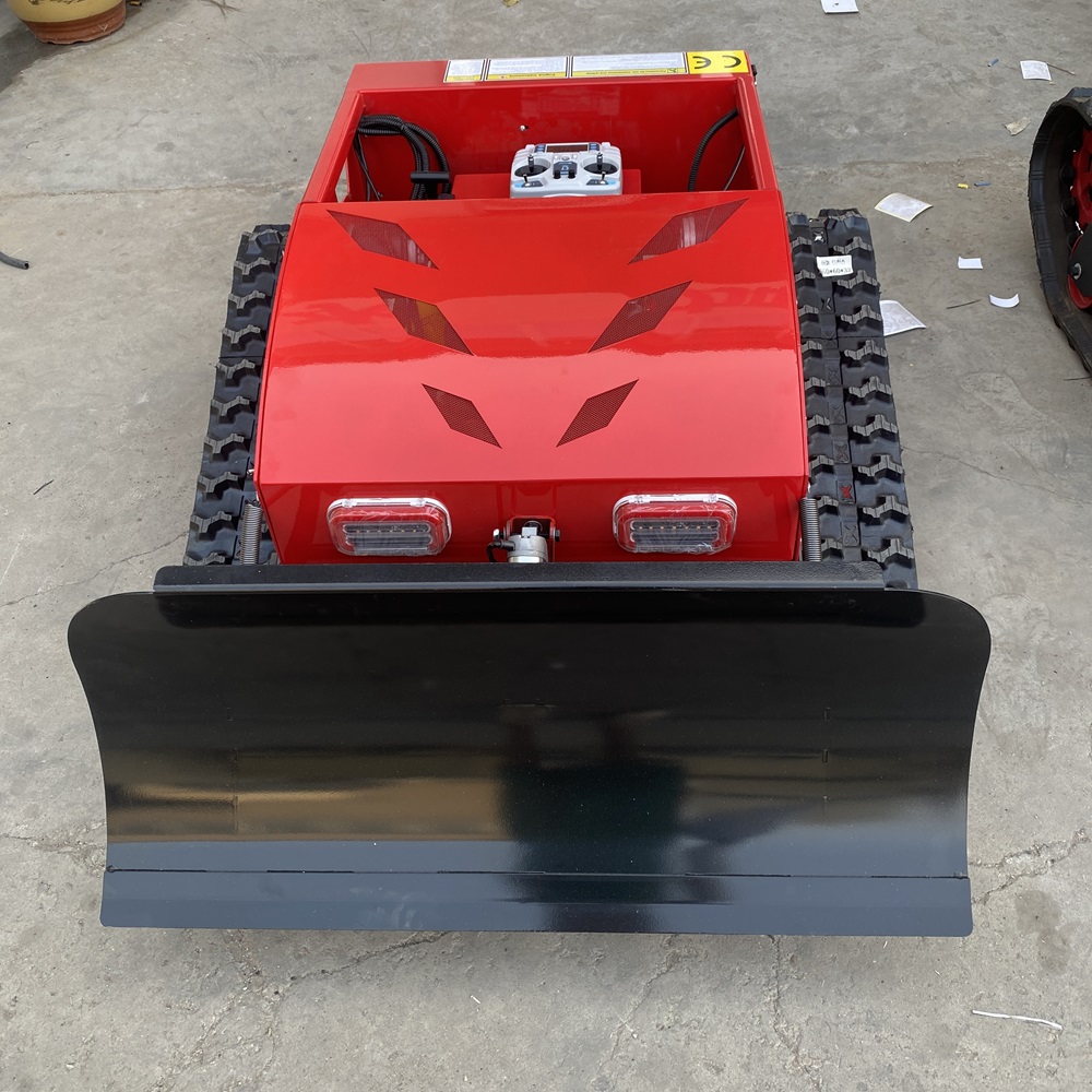 remote control lawn mower with a snow shovel